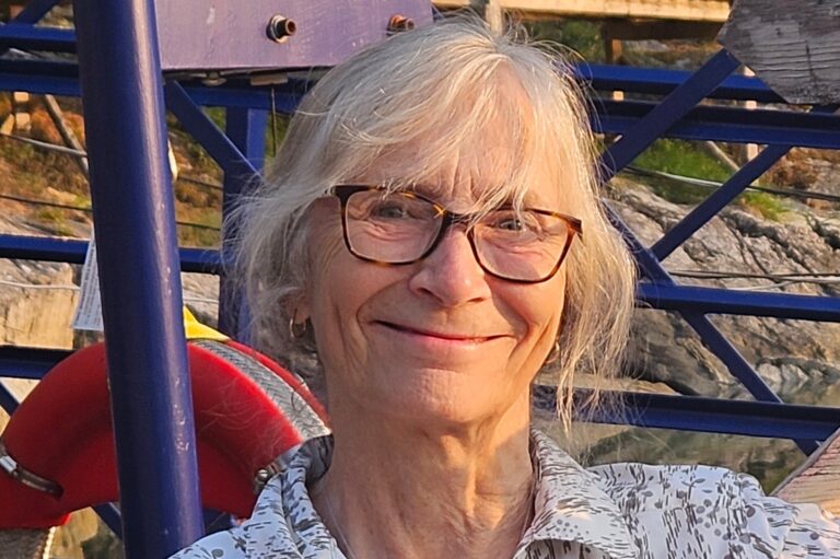 author Carol Murphy-Guerrero smiling for a photo outside